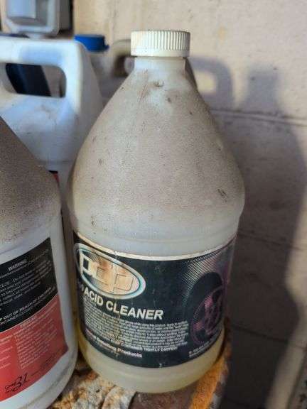 Assortment of motor oil and other vehicle fluids - most partially full