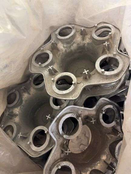 Tote of hub caps and parts -Chevy, Buick, and more