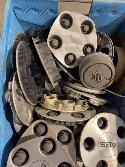 Tote of miscellaneous hubcaps/center caps - Chevy, Toyota, and more