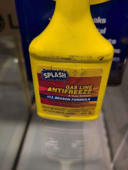 Flat of WD-40, oil, and other mechanic fluids
