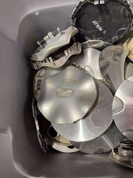 Tote of Miscellaneous hub caps and parts - Buick, Oldsmobile and more - see photos