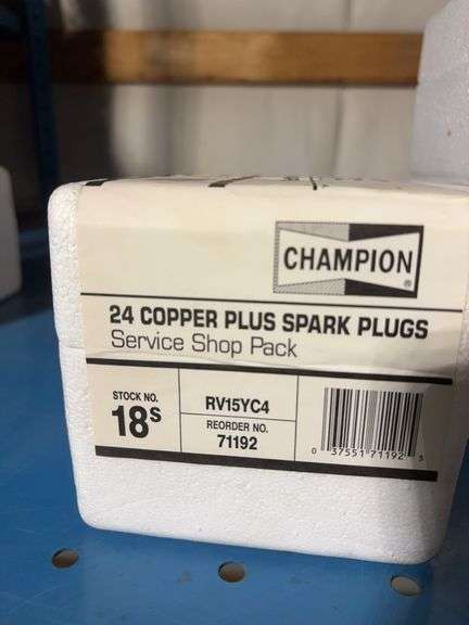 (4) Champion boxes of 24 copper plus spark plugs