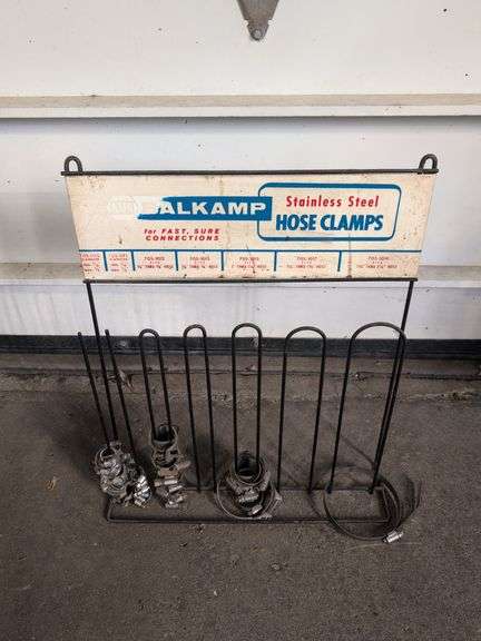 NAPA metal rack with hose clamps