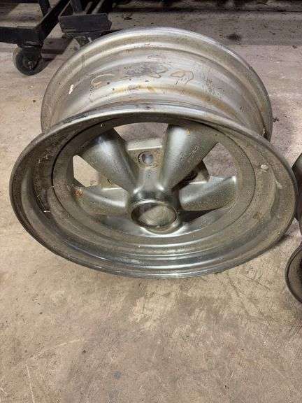 (3) wheel rims - (2) 15" and (1) 14"