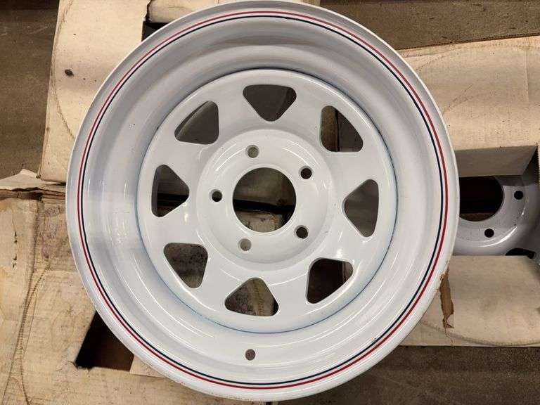 (4) 15” wheel rims in boxes