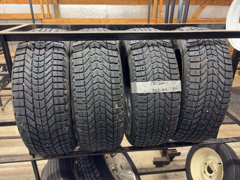 (4) studded tires like new - 225/60/17