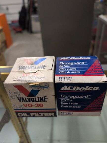 Assortment of oil filters in boxes - see photos
