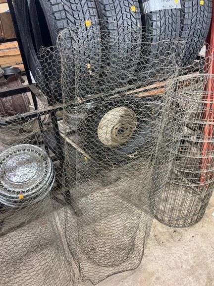 Chicken wire, metal fencing, and 6' wooden fencing