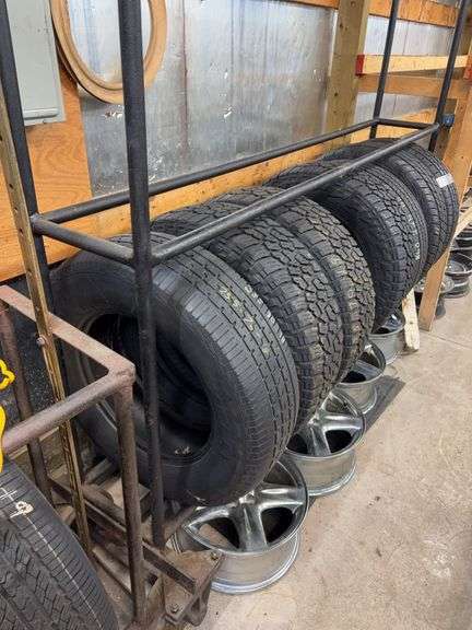 Metal tire rack on wheels - 86" x 14" x 80"
