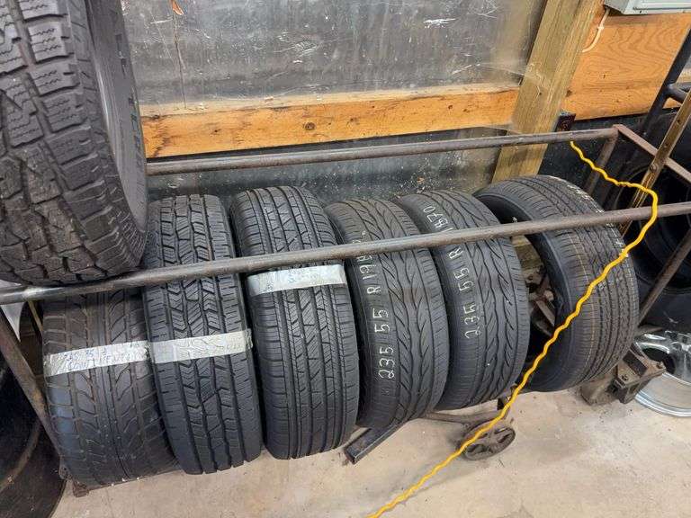 Metal tire rack on wheels - 74" long, 18" deep, 72" tall