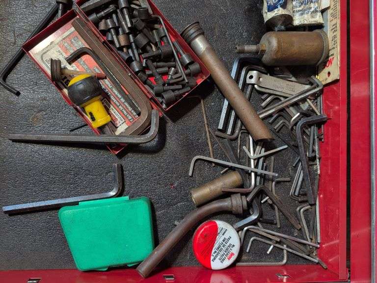 Drawer of drill bits, Allen wrenches, sockets, and more