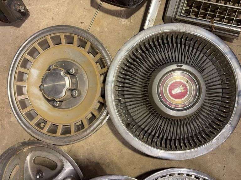 15+ hubcaps - see photos - PMD, Pontiac, and more