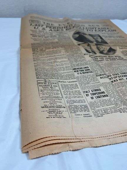 ANTIQUE NEWSPAPER AND ASSORTED BANNERS