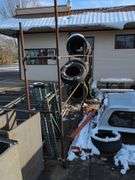 Metal tire rack - 21' x 18" x 7' - stored outside, contents not included