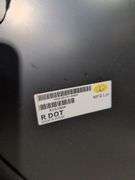 Unmarked black vehicle hood - see photos