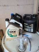 Assortment of motor oil and other vehicle fluids - most partially full