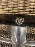 Miscellaneous grill covers, other vehicle parts and emblems