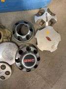 Tote of miscellaneous hubcaps/center caps - Chevy, Toyota, and more