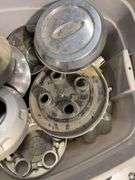 Tote of hub caps and parts -Nissan, Chevy, Ford and more