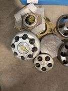 Tote of miscellaneous hubcaps/center caps - Chevy, Toyota, and more