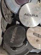 Tote of hubcaps/center caps - Acura, Nissan, Ram, and many more