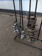 NAPA metal rack with hose clamps