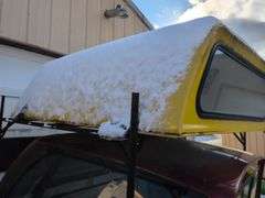 Yellow truckbed cap for a Dodge - 6' wide, 79" long