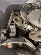 Tote of Miscellaneous hub caps and parts -see photos