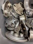 Tote of Ford hub caps and parts