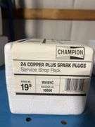 (4) Champion boxes of 24 copper plus spark plugs