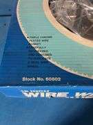 (4) 15 inch wire wheel covers matching in box