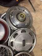 15+ hubcaps - see photos - Chevy, Buick, and more