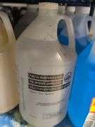 Shelf of coolant, cleaners, windshield washer solvent, and more