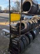 Metal tire rack - 21' x 18" x 7' - stored outside, contents not included
