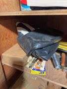 Contents of cabinet - oil filters, wiper blades, CB radios, manuals, and more