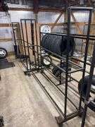 Metal tire rack on wheels - 86" x 14" x 75"