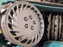 Tote of hubcaps - Mazda and others