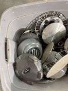 Tote of miscellaneous hub caps and parts -Ford, Toyota and more