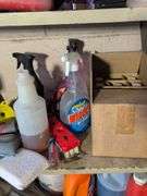 Shelf of glass cleaner, other cleaners, and other vehicle fluids