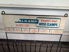 NAPA metal rack with hose clamps