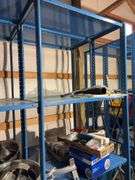 Large blue storage shelf 9’ long, 3’ deep, 7.5’ tall -Contents not included