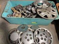 Large tote of hub caps and parts -Honda, Mazda, Nissan and more