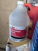 Assortment of motor oil and other vehicle fluids - most partially full