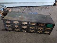 Metal hardware cabinet with nuts and bolts