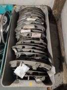 Tote of hubcaps - Honda, Cadillac, and more