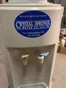 Crystal Springs water cooler with (2) jugs