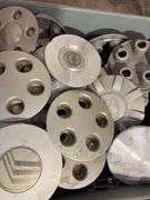 Large lot of miscellaneous hub caps and parts, paste wax and more