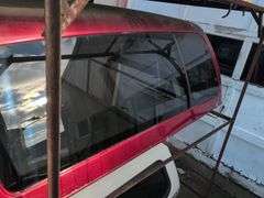 Red Fleer truckbed cap for a Chevy - 7' long, 6' wide