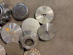 Tote of hubcaps/center caps - mostly Ford