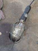 Work light on extension reel and suction gun